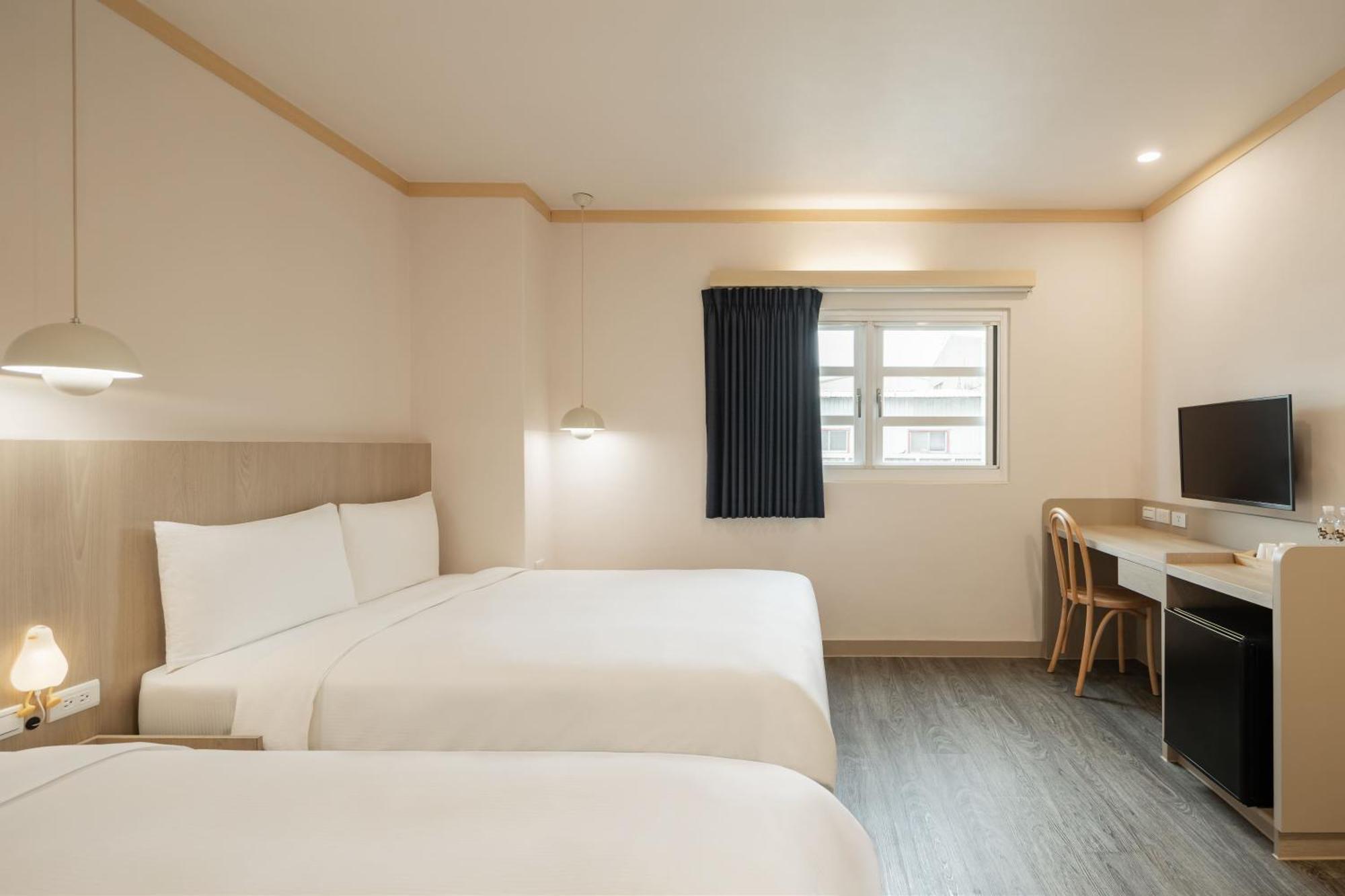 Kindness Hotel - Tainan Minsheng Habitación foto