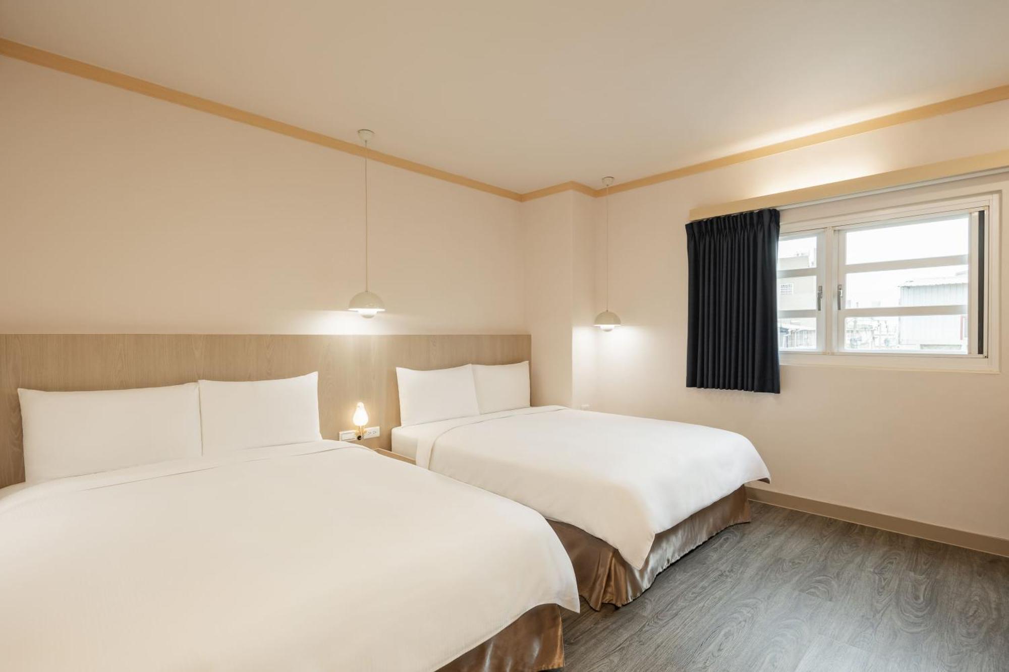 Kindness Hotel - Tainan Minsheng Habitación foto